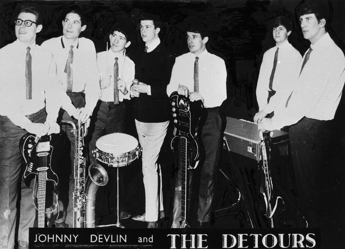 Johnny Devlin & the Detours, 1962 or 1963, from left: Arthur Biggs, Bob Pettit, Bernie Smith, Johnny Devlin, Bryan Stevens, Mick Ketley, and Chuck Fryers