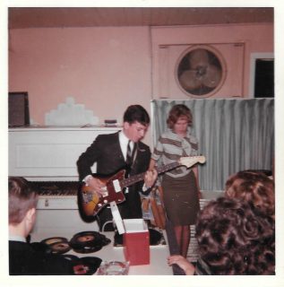 Unidentified guitarist with records